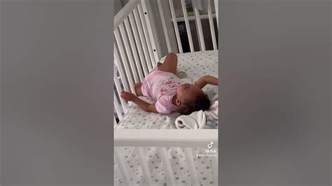 baby gets legs caught in crib rails